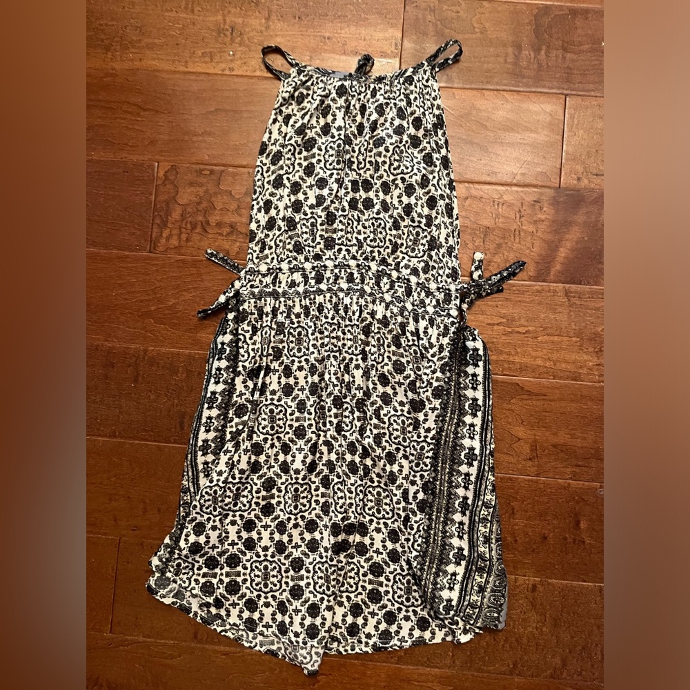 Black and White Patterned flowy dress free people open side size small